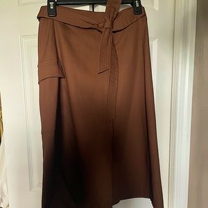 BROWN HIGH WAIST CROSS WRAP SKIRT WITH TIE WAIST AND SIZE ARCHITECTURAL POCKET!